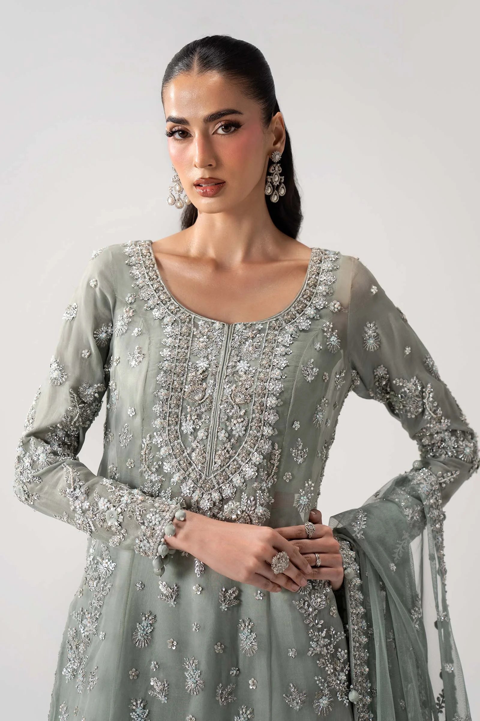 "Focus on four-sided heavy embroidered tissue velvet dupatta paired with Maria B MC-26V1-05 formal set."