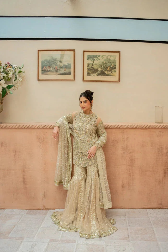 "Mirha Collections Mysie by Tahira Mantra golden embellished heavy luxury net shirt with tailored trousers formal set."