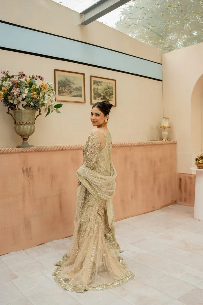 "Detailed view of intricate hemline borders, cutwork daman finishing, and heavy embellishments on Mysie by Tahira Mantra."