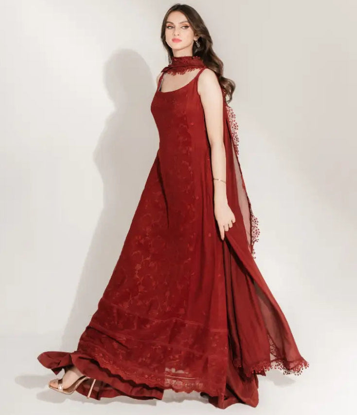 "Focus on the wide-leg sharara hemline flare and delicate lace insertions, showing precision boutique tailoring."