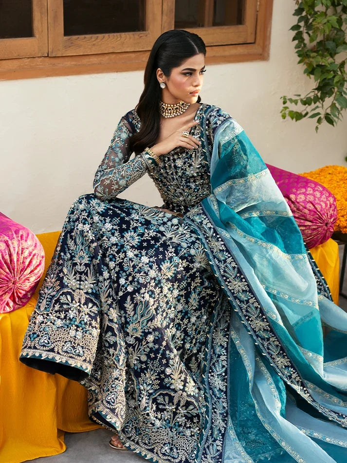 "Close-up detailing on the Gulaal Meena shirt bodice, displaying hand-worked adda embellishments, sheesha accents, panni embroidery, and fine organza fabric texture."