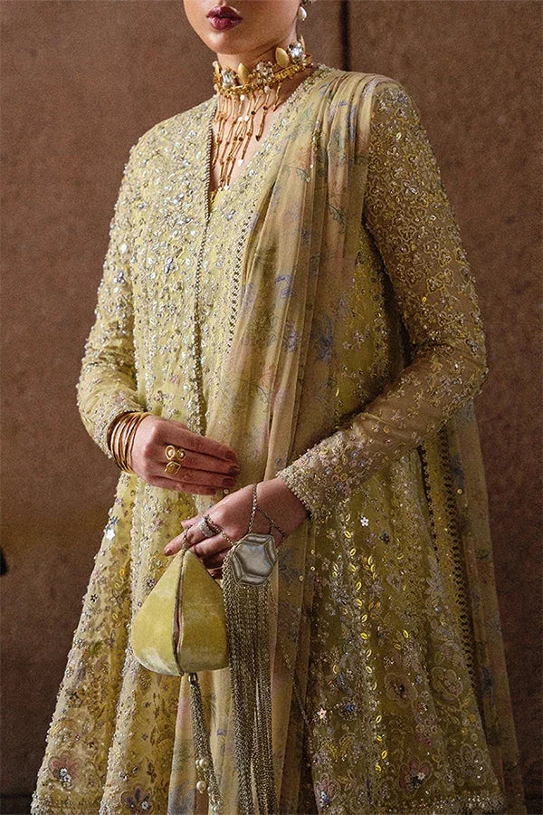 "Close-up of hand-worked zardozi, sparkling sequin accents, and fine resham threadwork embroidery on Suffuse Merivah shirt bodice."