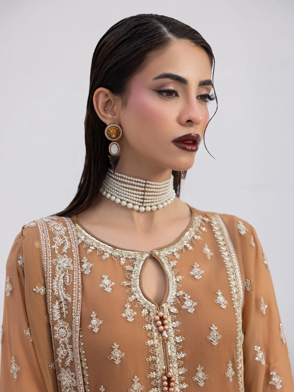"Close-up detailing on the Gulaal Mirage shirt bodice, displaying fine threadwork embroidery, delicate sequin accents, and soft fabric texture."
