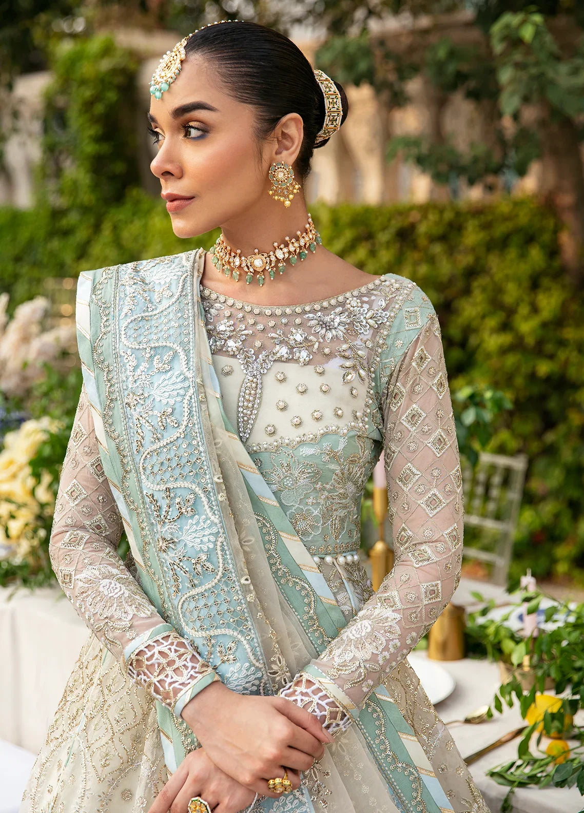 "Close-up detailing on the Gulaal Nareena shirt bodice, displaying hand-worked adda embellishments, sheesha accents, panni embroidery, and fine fabric texture."