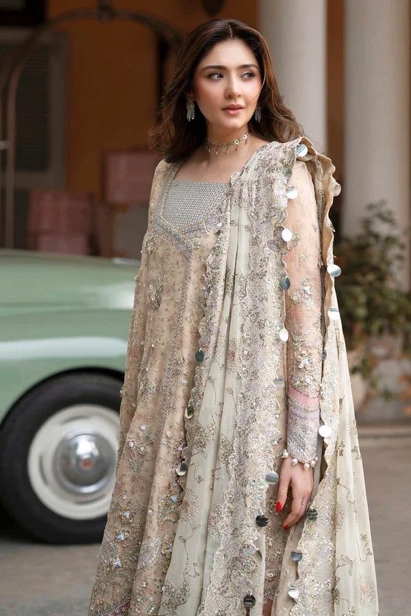"Close-up of exquisite hand-worked embellishments, sequence highlights, and rich threadwork embroidery on Nureh NL-96 Izel shirt."