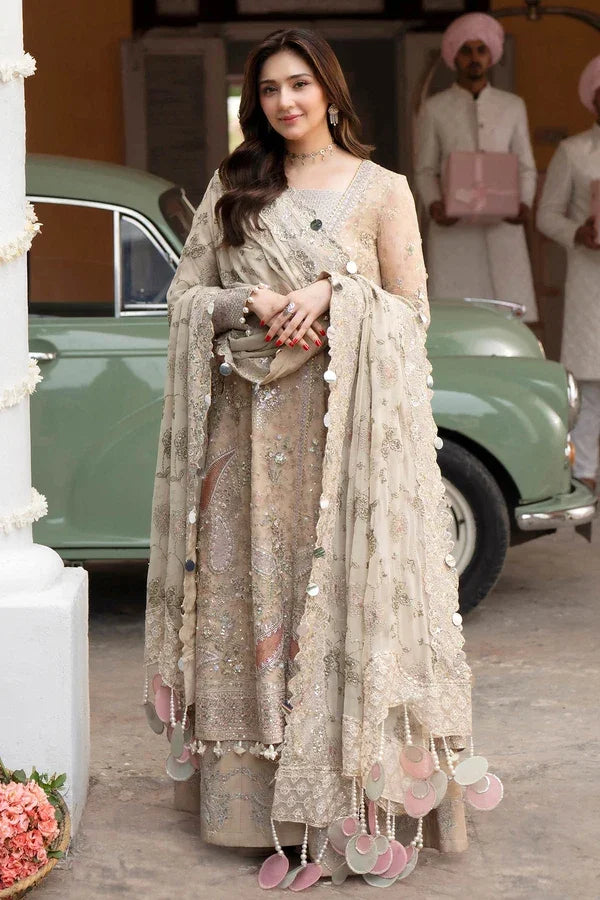 "Focus on matching heavy statement embroidered dupatta framed with detailed four-sided borders paired with Nureh NL-96 Izel set."