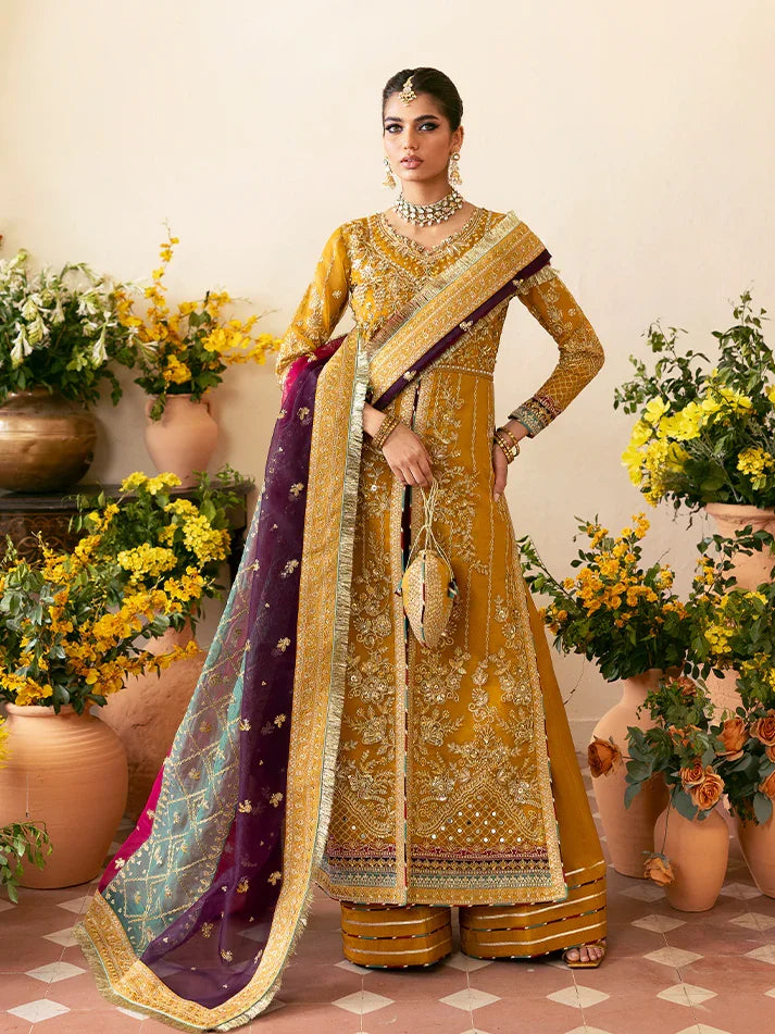 "Mirha Collections Gulaal Nayaara mustard luxury hand-embellished stitched three-piece organza suit. Full-length front view featuring tailored shirt, embellished dupatta, and raw silk trousers."