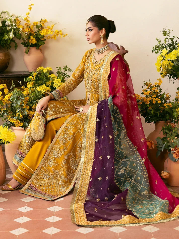 "Focus on the intricate sleeve cuff trimmings and embroidered hemline border details of the Gulaal Nayaara stitched luxury suit, showing boutique-quality tailoring."