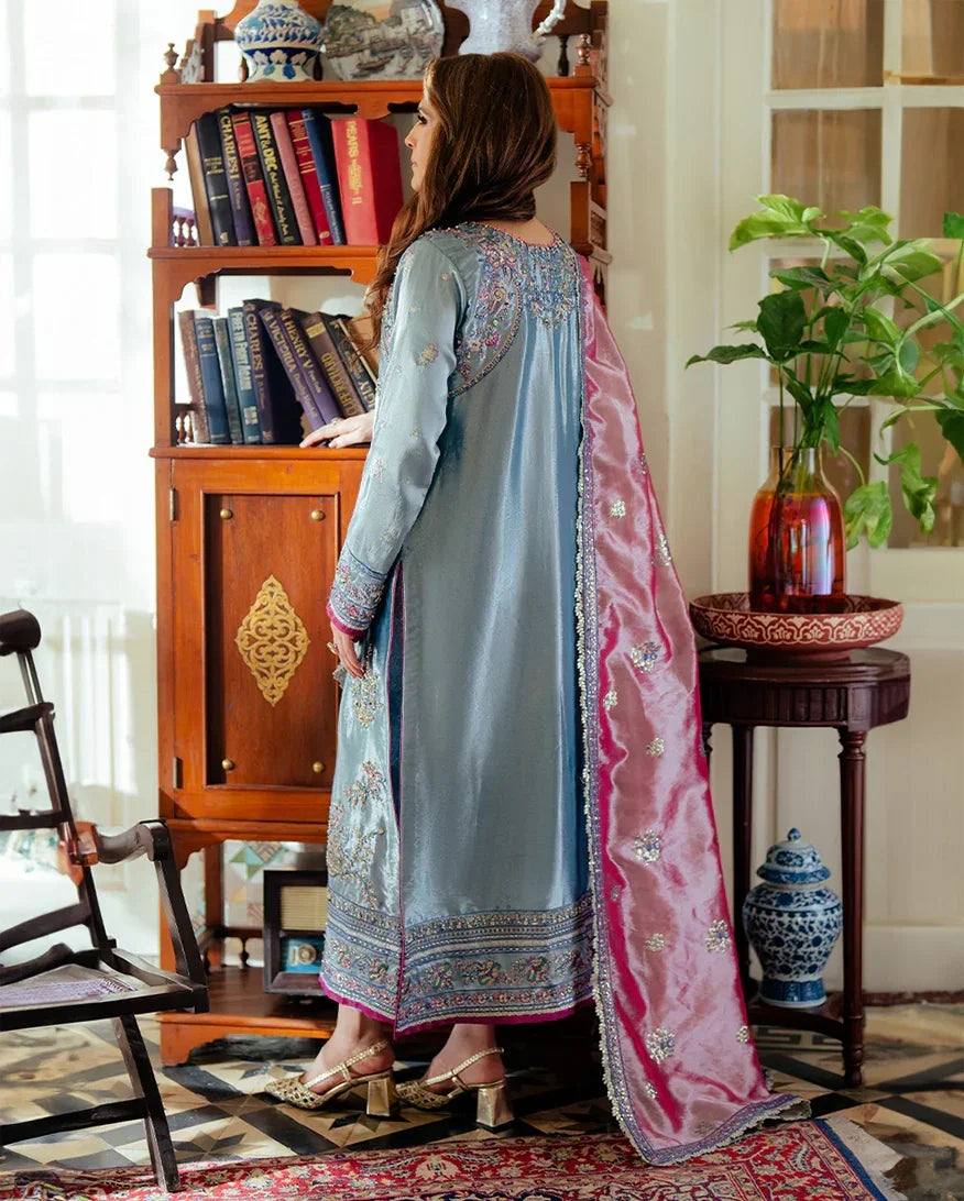 "Detailed drape view of the fluid gold zari tissue dupatta paired with the royal blue Mushq Neelam luxury formal suit from Mirha Collections."