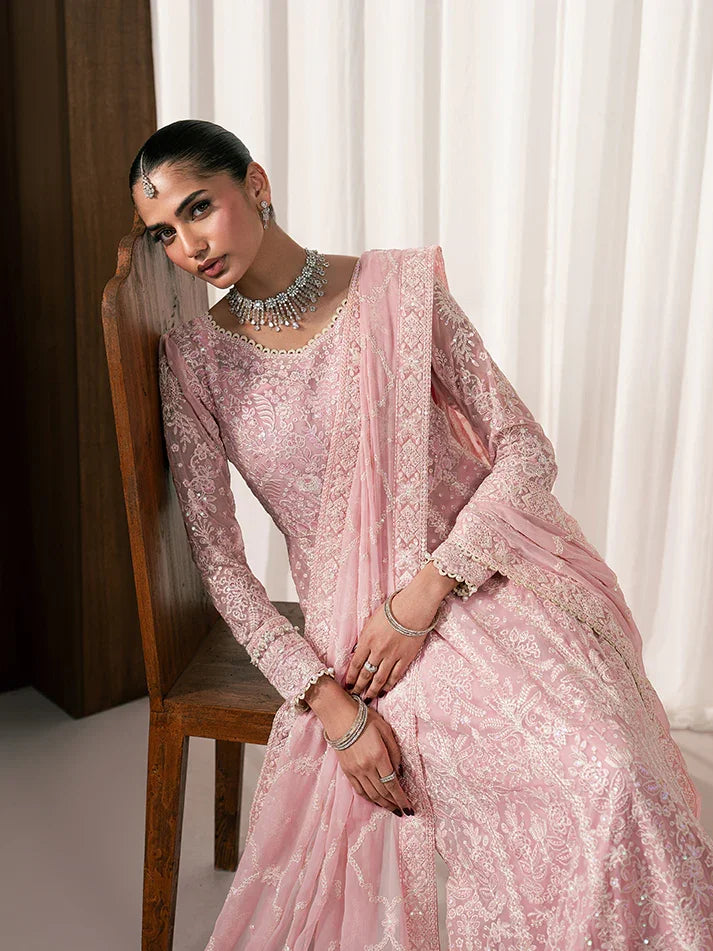 "Focus on the intricate sleeve cuff trimmings and lace hemline details of the Gulaal Noa stitched luxury suit, showing boutique-quality tailoring."