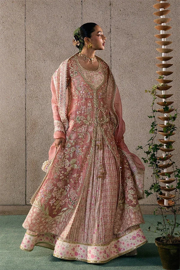 "Detailed view of intricate embroidered organza borders and scalloped hemline finishings on Suffuse Novara wedding suit."