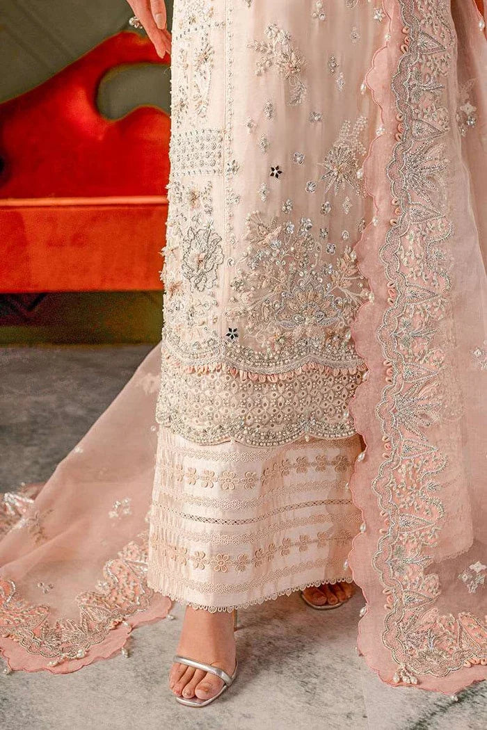 "Matching embellished sheer dupatta and sleeve border finishing details on the Vera pale peach Azaar formal suit."