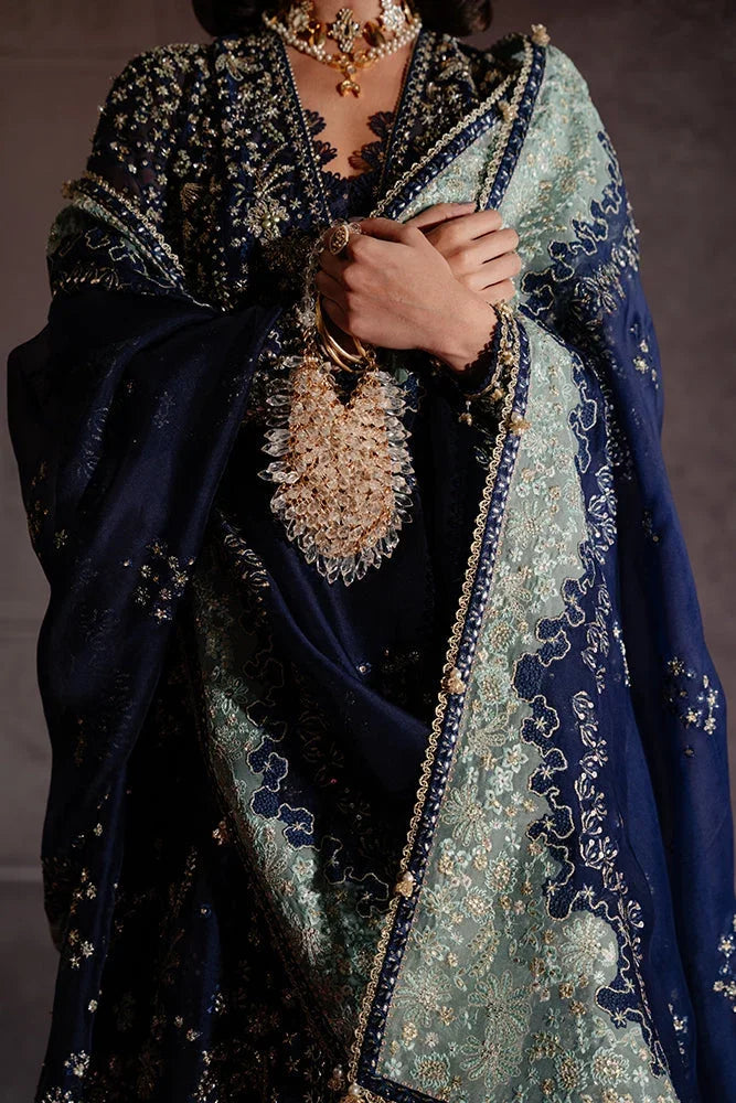 "Close-up of hand-worked zardozi, sparkling sequin accents, and resham threadwork embroidery on the Suffuse Rishaal shirt bodice."