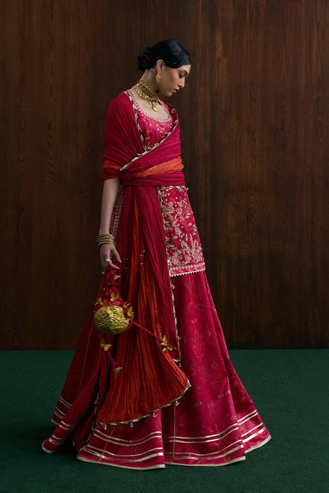 "Focus on matching printed silk/organza dupatta drape paired with Suffuse Ryelle luxury pret set."
