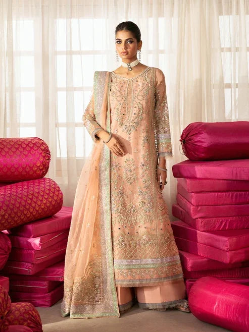 "Mirha Collections Gulaal Raniya mellow rose luxury hand-embellished stitched three-piece organza suit with raw silk sharara. Full-length front view featuring tailored shirt, statement dupatta, and flared bottoms."