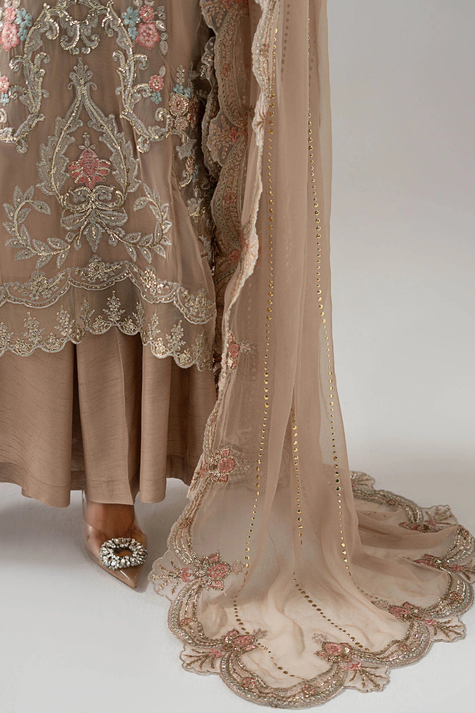 "Detailed drape view of the mukaish embellished Bemberg chiffon dupatta with four-sided scalloped embroidered borders paired with the Maria B SF-EA25-18R1 suit from Mirha Collections."