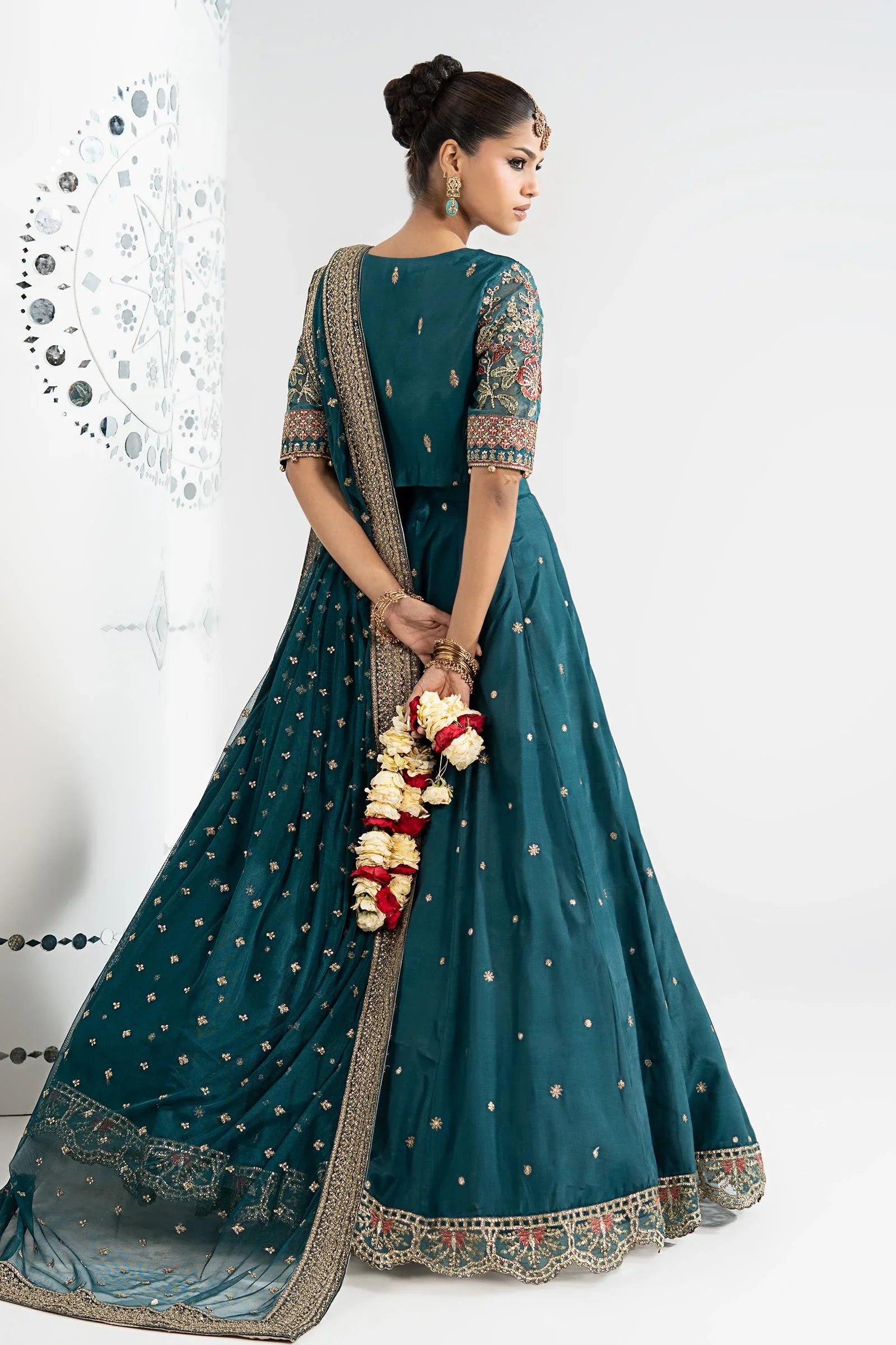 "Detailed drape view of the fluid luxury embroidered statement organza dupatta with cutwork borders paired with the Maria B SF-EA26-27 suit from Mirha Collections."