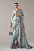 "Mirha Collections Maria B SF-PF26-08 aqua blue luxury hand-embellished charmeuse silk saree. Full-length front drape featuring embellished blouse and statement saree pallu."
