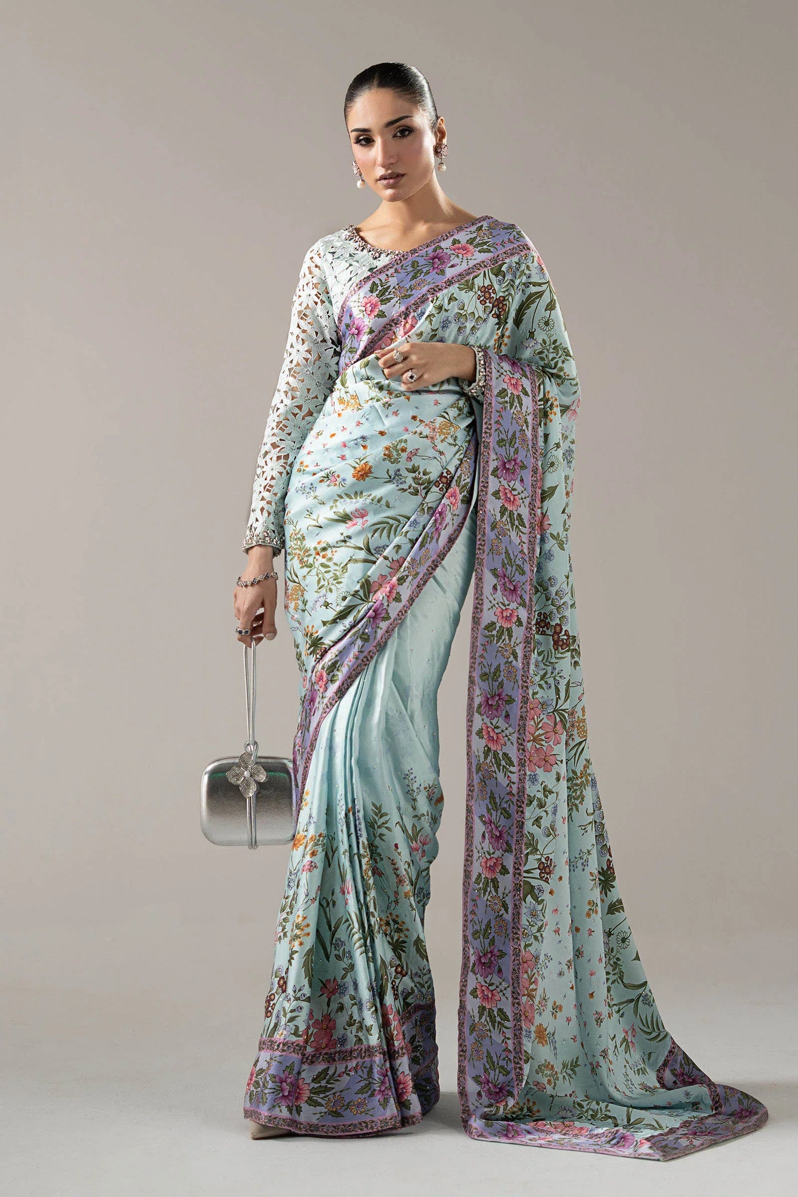"Mirha Collections Maria B SF-PF26-08 aqua blue luxury hand-embellished charmeuse silk saree. Full-length front drape featuring embellished blouse and statement saree pallu."