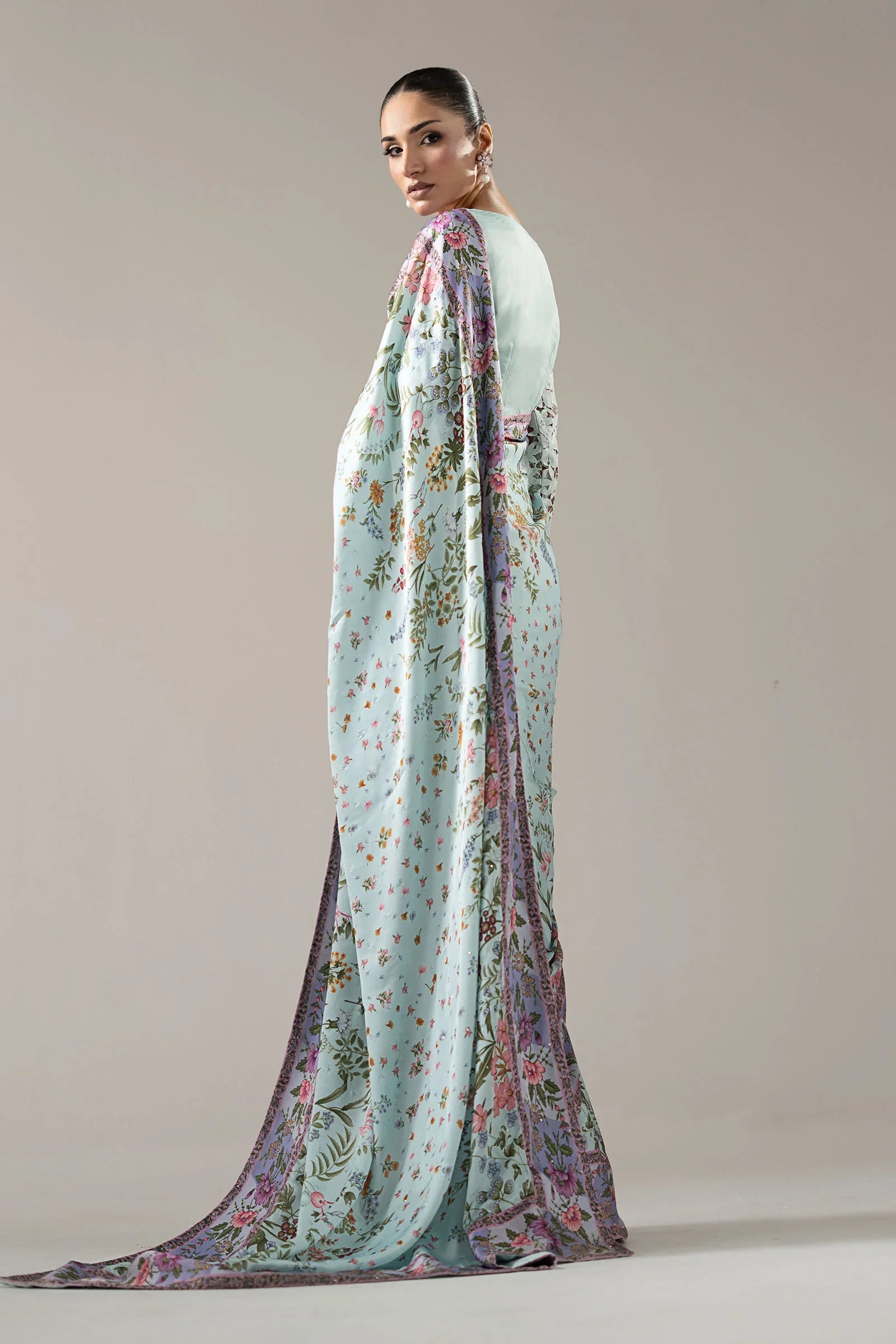 "Detailed drape view of the fluid aqua charmeuse silk saree pallu with intricate border finishings from the Maria B SF-PF26-08 collection at Mirha Collections."