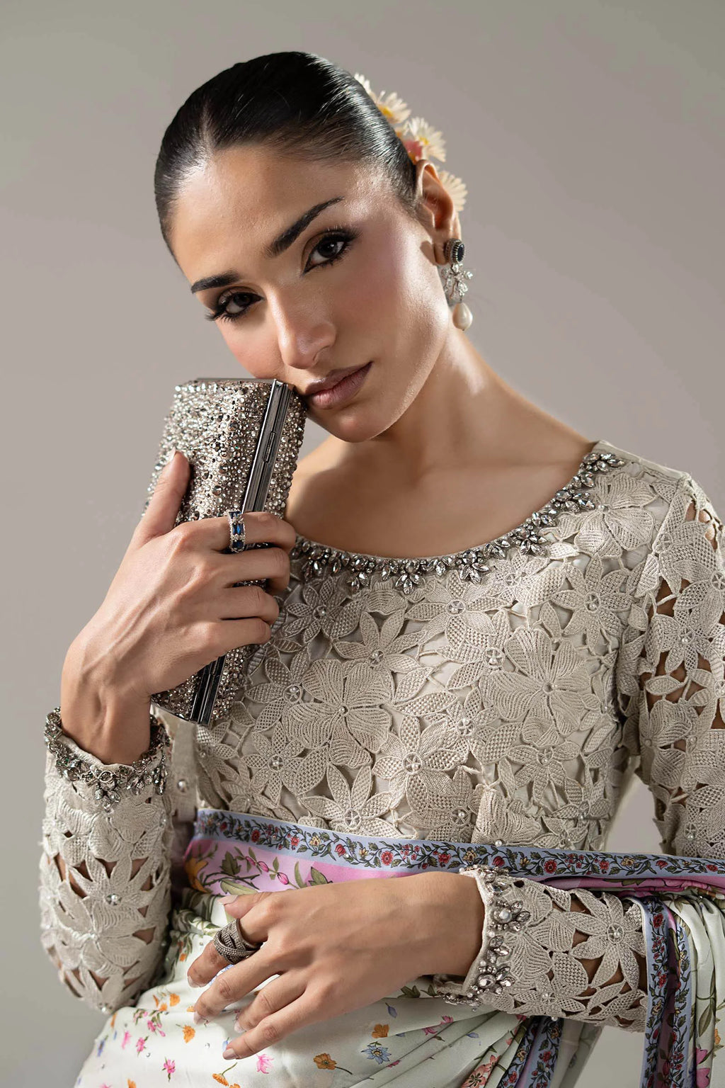 "Close-up detailing on the Maria B SF-PF26-08 Off-White blouse bodice, displaying hand-worked adda embellishments, sequin accents, and fine charmeuse silk fabric."