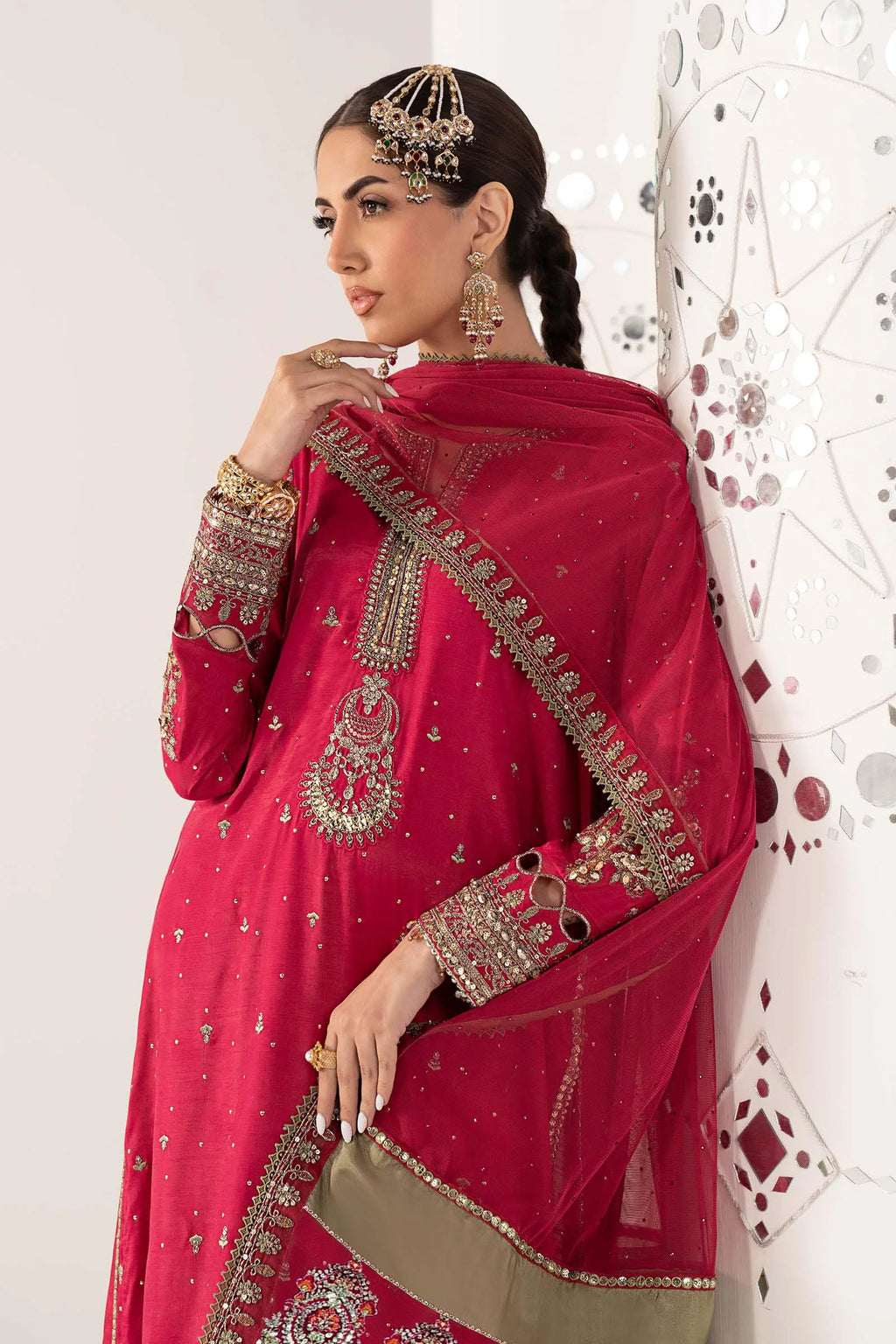 "Focus on the intricate sleeve cuff trimmings and embroidered hemline organza border details of the Maria B SF-PF26-10 Pink stitched luxury suit, showing boutique-quality tailoring."