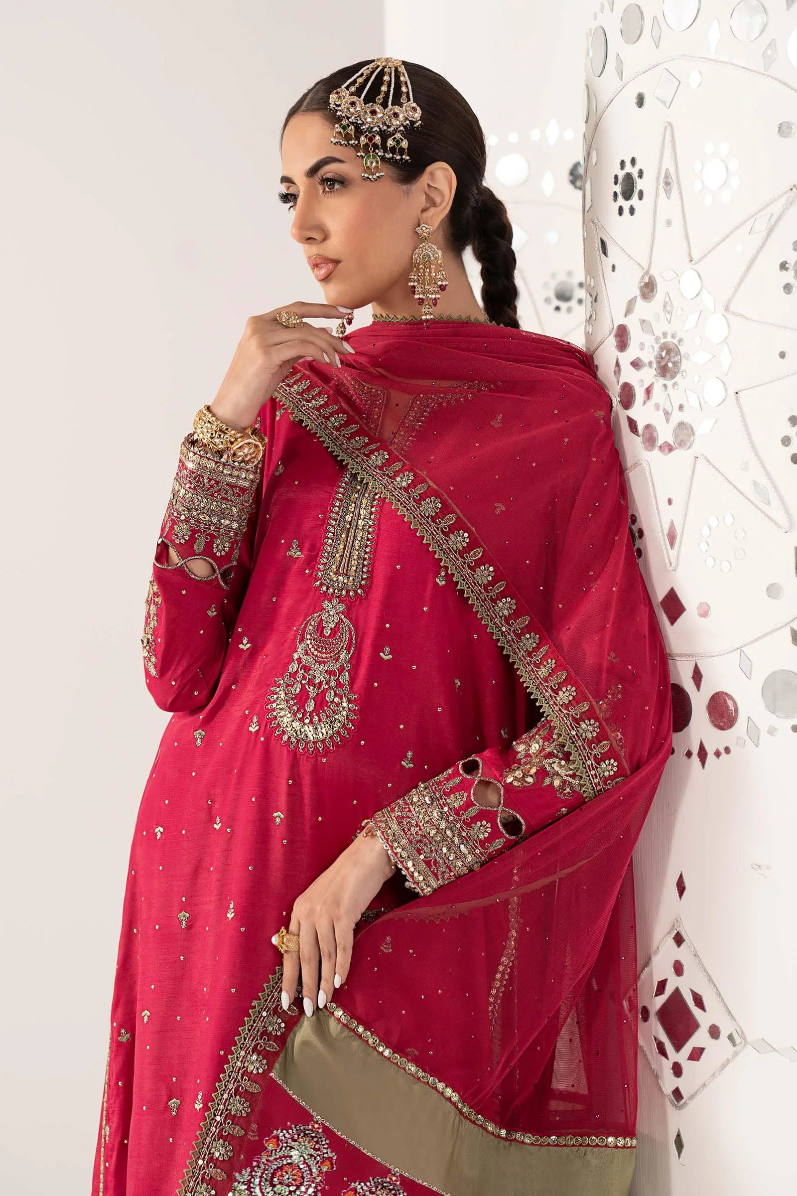"Focus on the intricate sleeve cuff trimmings and embroidered hemline organza border details of the Maria B SF-PF26-10 Pink stitched luxury suit, showing boutique-quality tailoring."