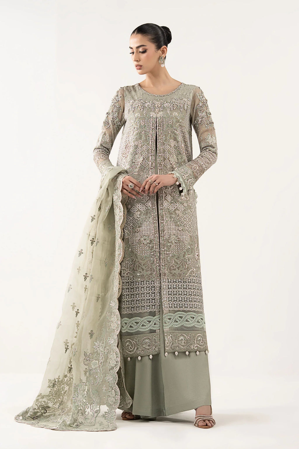 "Mirha Collections Maria B SF-W25-24 sea green luxury hand-embellished stitched three-piece silk suit. Full-length front view featuring tailored shirt, statement dupatta, and silk trousers."