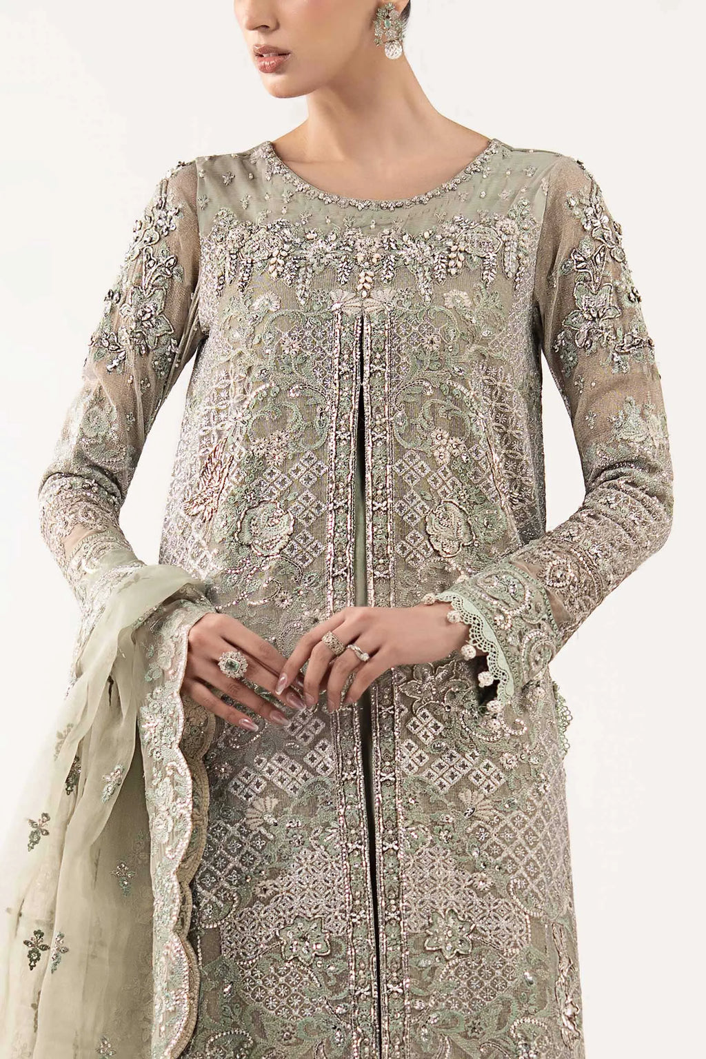 "Close-up detailing on the Maria B SF-W25-24 Sea Green shirt bodice, displaying hand-worked adda embellishments, sparkling sequin accents, and fine silk fabric texture."