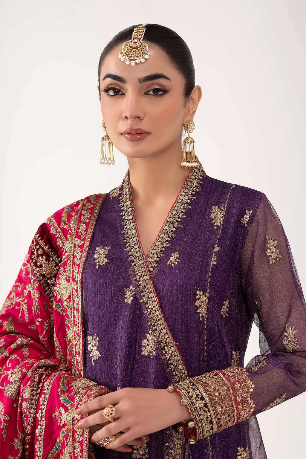 "Close-up detailing on the Maria B SF-W25-37 Purple shirt bodice, displaying hand-worked adda embellishments, sparkling sequin accents, and rich silk fabric texture."