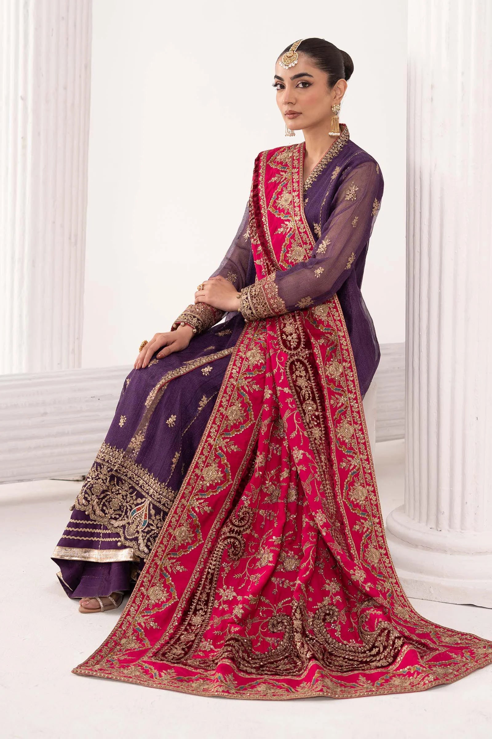 "Detailed drape view of the fluid luxury embroidered statement dupatta with scalloped cutwork borders paired with the Maria B SF-W25-37 Purple formal suit from Mirha Collections."