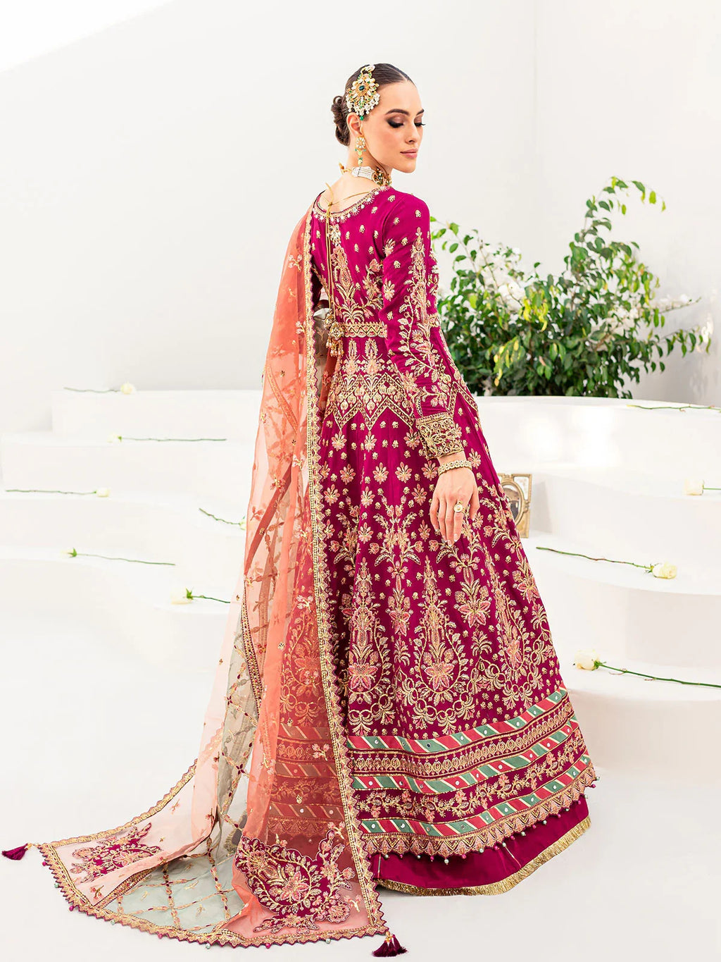 "Focus on the intricate sleeve cuff trimmings and multi-hued embroidered hemline border details of the Gulaal Satrangi 01 stitched luxury suit, showing boutique-quality tailoring."