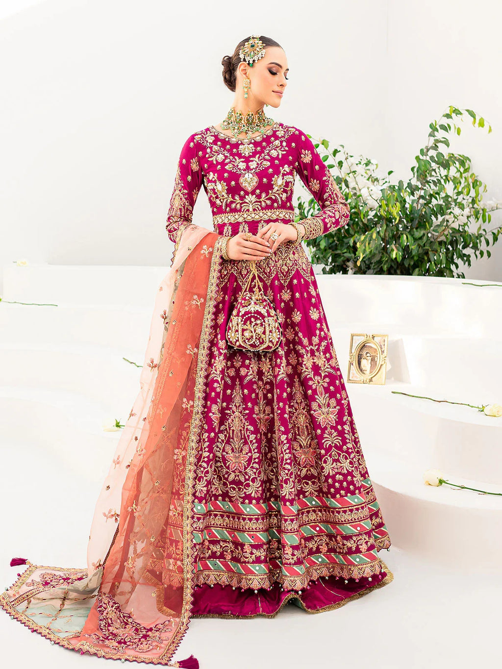 "Detailed drape view of the fluid luxury embroidered statement dupatta with vibrant border motifs paired with the Gulaal Satrangi 01 formal suit from Mirha Collections."