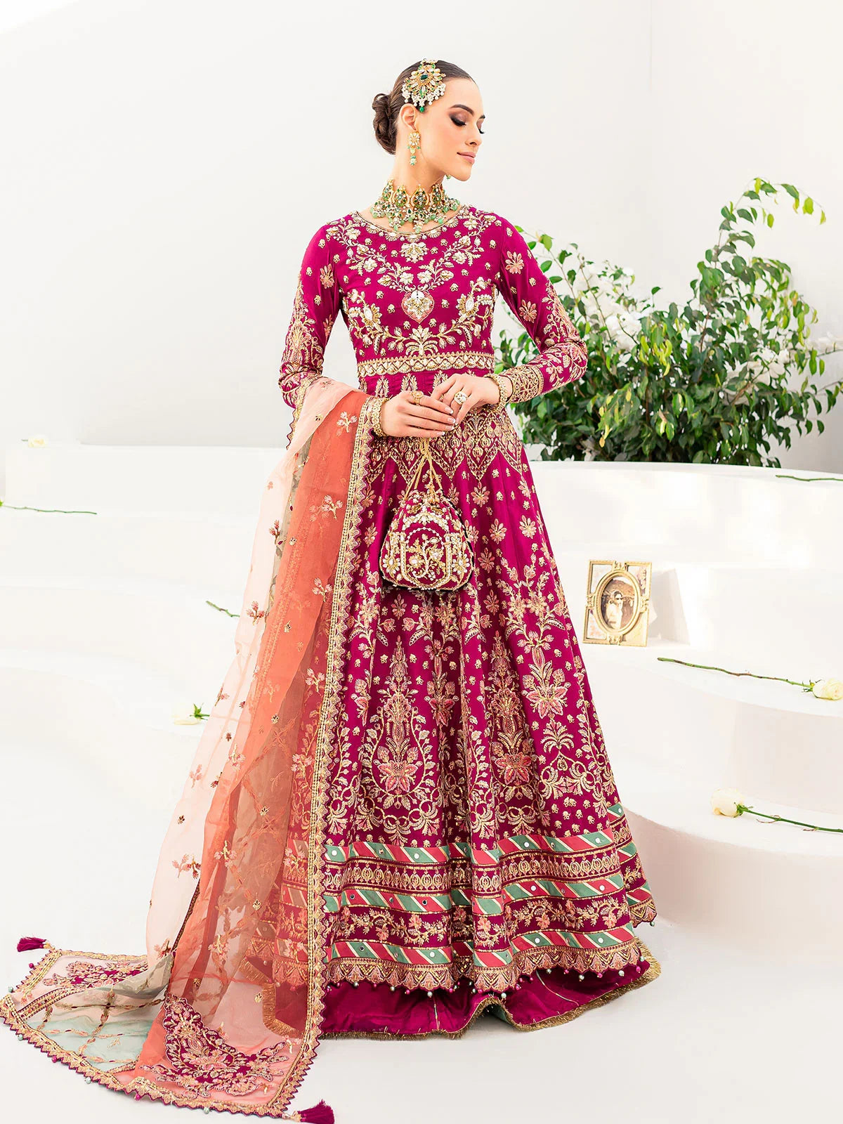 "Detailed drape view of the fluid luxury embroidered statement dupatta with vibrant border motifs paired with the Gulaal Satrangi 01 formal suit from Mirha Collections."