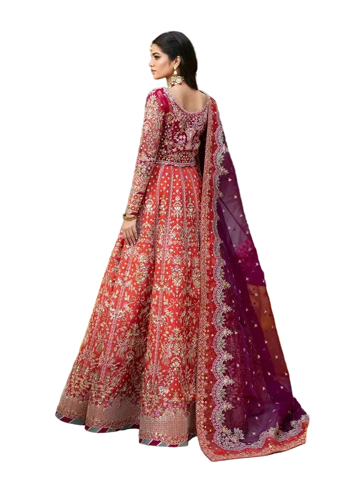 "Focus on the intricate sleeve cuff trimmings and cutwork hemline details of the Gulaal Shabnam stitched luxury suit, showing boutique-quality tailoring."
