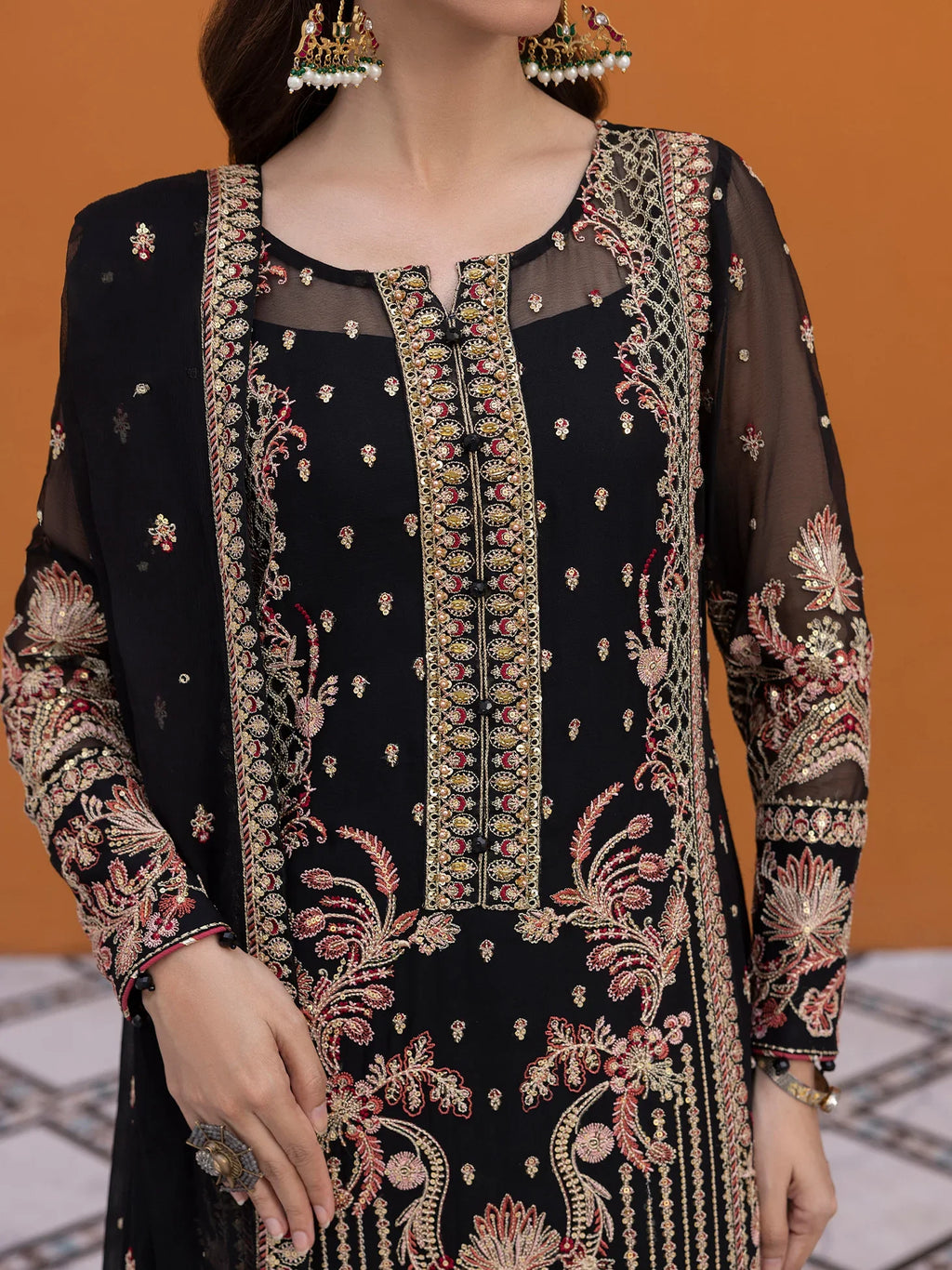 "Close-up detailing on the Gulaal Soir shirt bodice, displaying fine threadwork embroidery, delicate sequin accents, and rich fabric texture."