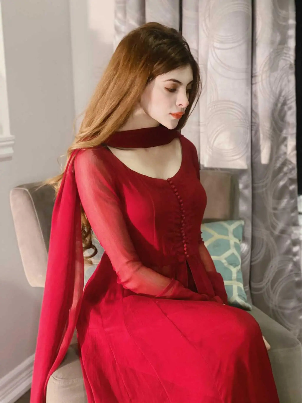 "Close-up detailing on the LXM Regal Red Kalidaar shirt bodice, displaying fine neckline finishes, attached lining, and soft chiffon texture."
