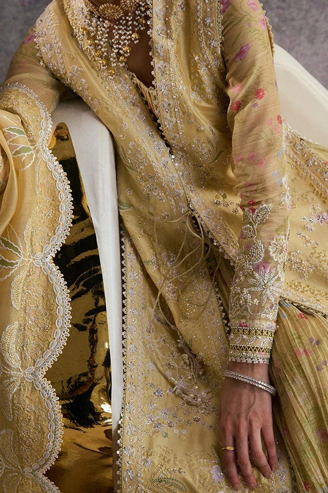 "Close-up of fine resham embroidery, sequin highlights, and lace detailing on the Suffuse Urah silk shirt neckline."