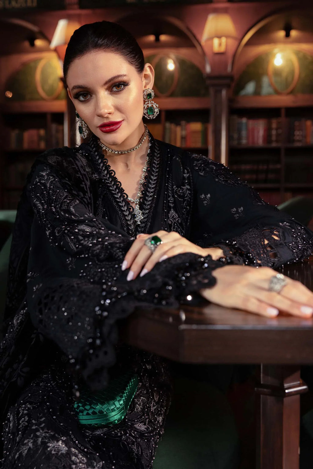 "Focus on the intricate sleeve cuff trimmings and hemline border details of the Maria B WL-1307 stitched linen suit, showing boutique-quality tailoring."