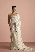 "Mirha Collections Vera white shimmer organza saree draped with hand-embellished blouse luxury designer formal outfit."