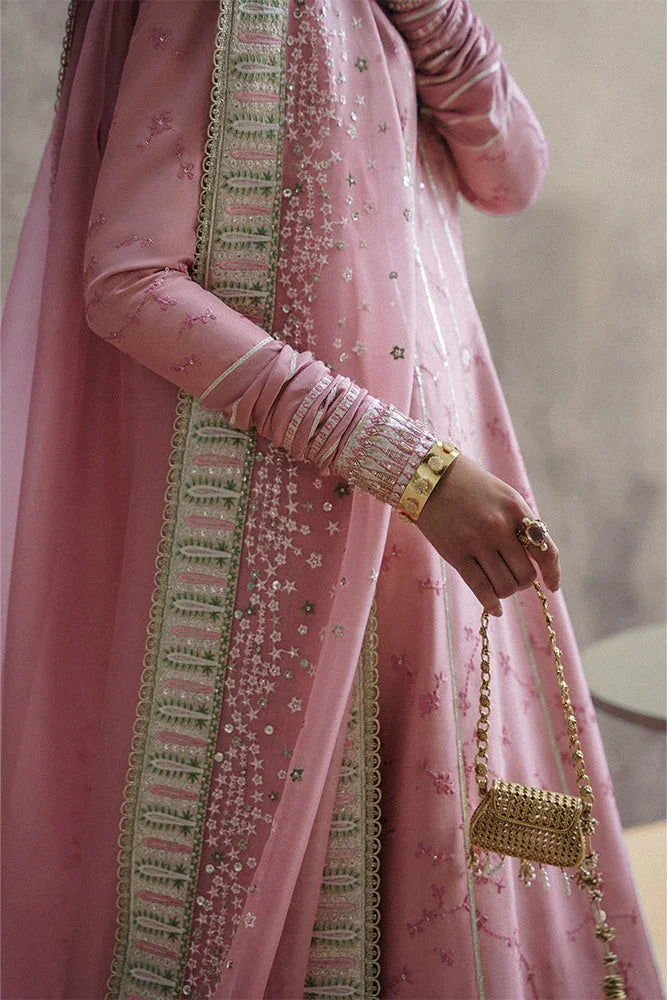 "Close-up of fine resham embroidery, hand-worked pearl accents, and lace detailing on the Suffuse Zareen silk shirt neckline."