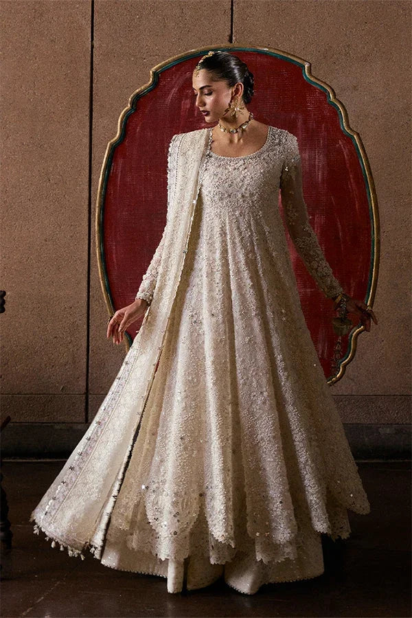 "Focus on matching embellished net dupatta framed with four-sided pearl and embroidered borders paired with Suffuse Zahrell set."