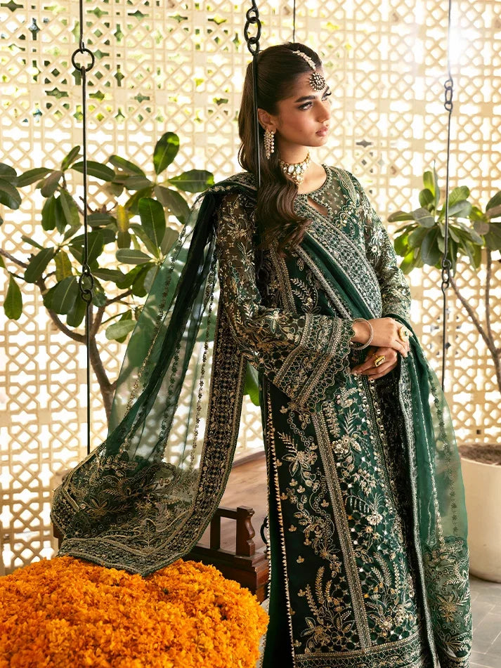 "Focus on the intricate sleeve cuff trimmings and cutwork hemline details of the Gulaal Zayra stitched luxury suit, showing boutique-quality tailoring."