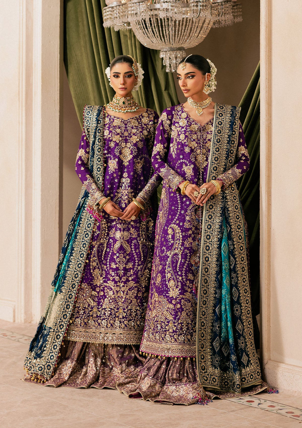 "Mirha Collections Wedding Festive Look A2601 luxury three-piece Pakistani designer suit. Full-length presentation showcasing a heavily embroidered medium silk long shirt paired with a contemporary flowing crushed sharara pants layout."