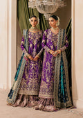 "Mirha Collections Wedding Festive Look A2601 luxury three-piece Pakistani designer suit. Full-length presentation showcasing a heavily embroidered medium silk long shirt paired with a contemporary flowing crushed sharara pants layout."