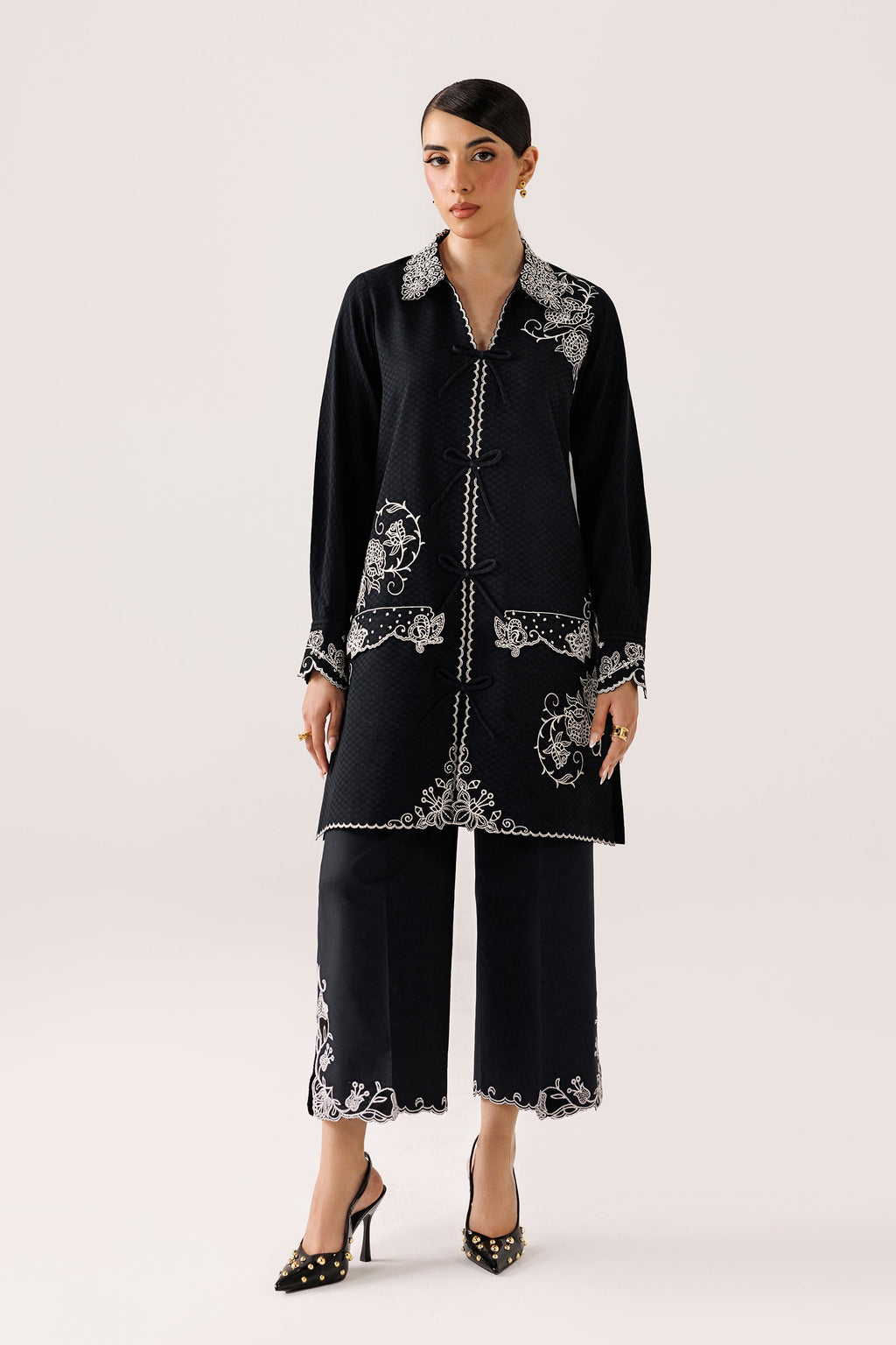 "Mirha Collections Qalamkar QEC-02 Ana luxury embroidered stitched three-piece suit. Full-length front view featuring tailored shirt, designer dupatta, and trousers."