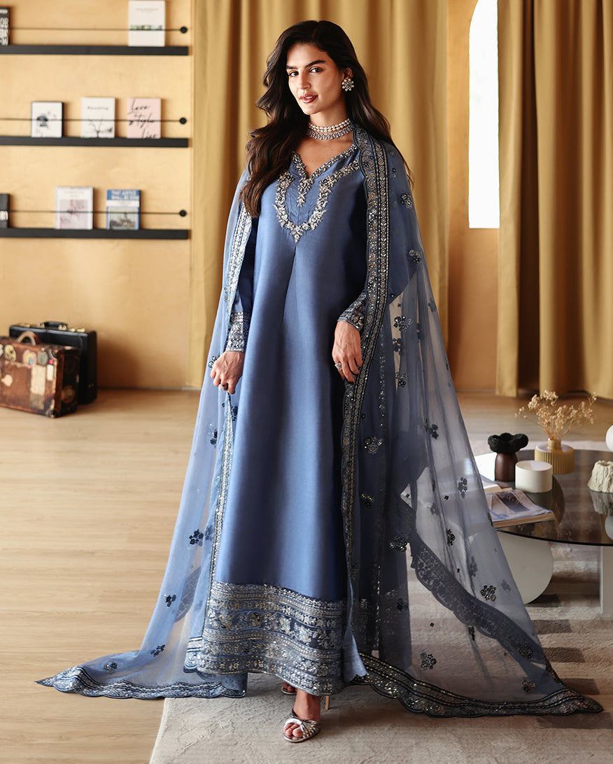 "Mirha Collections Mushq Auren luxury embroidered stitched three-piece suit. Full-length front view featuring tailored shirt, designer dupatta, and trousers."