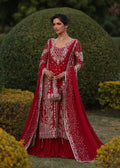 "Mirha Collections Kanwal Malik Aden luxury three-piece Pakistani designer formal suit. Full-length presentation showcasing a striking deep magenta pink embroidered straight shirt beautifully paired with a matching flared gharara pants layout and a luxury dupatta."