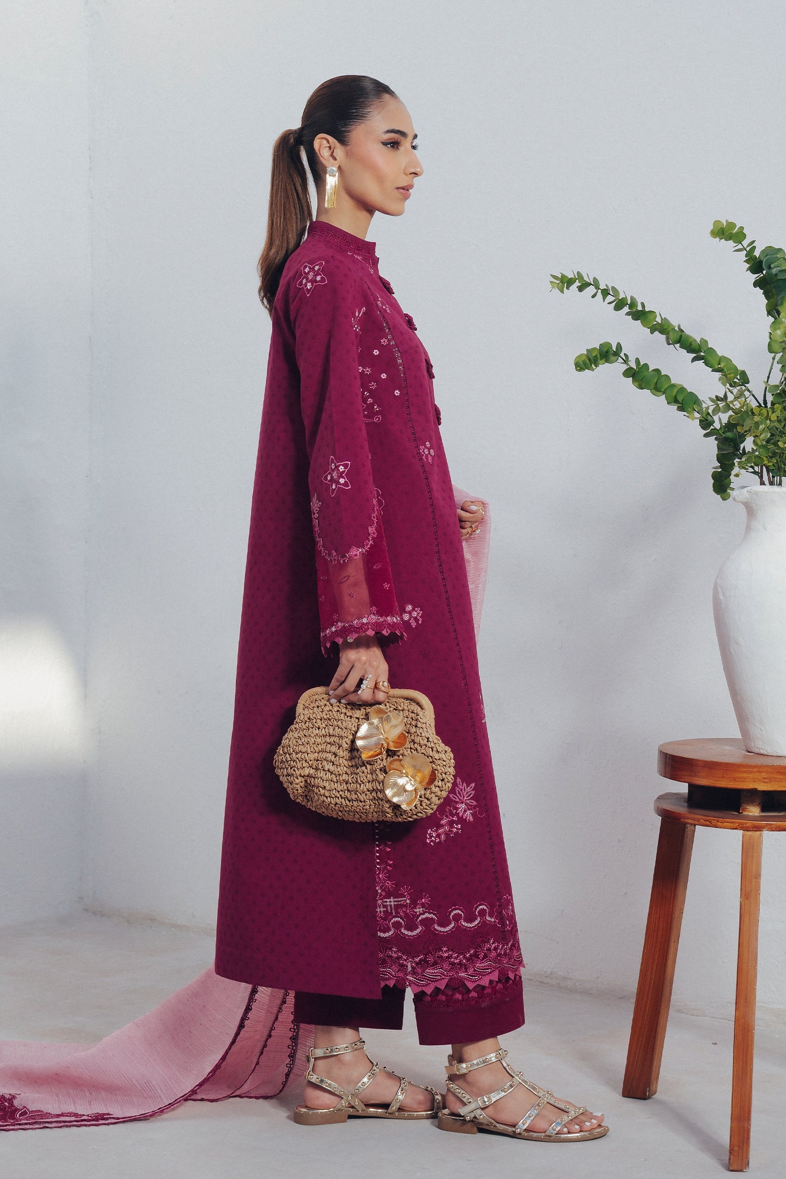 "Close-up detailing on the Qalamkar QBP-04 LIVIA shirt bodice, displaying fine threadwork embroidery, embellished neck finishes, and soft fabric texture."