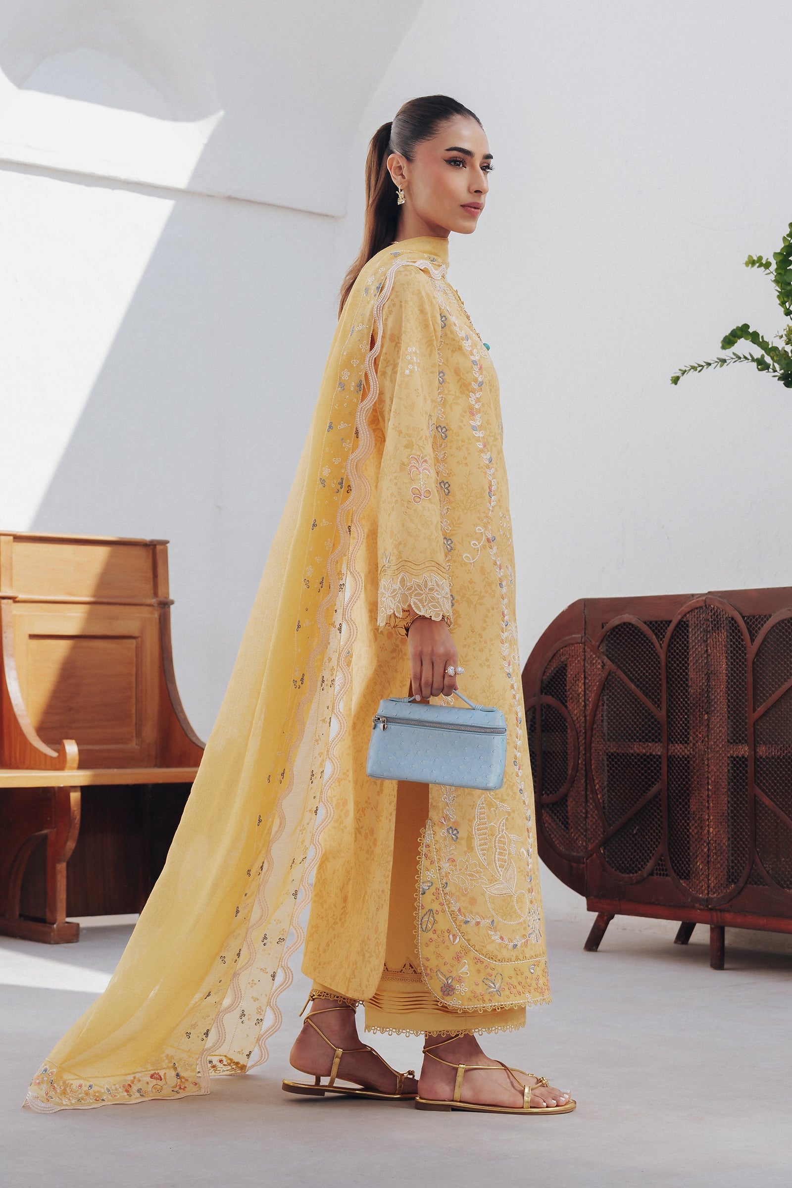 "Close-up detailing on the Qalamkar QBP-06 CLARA shirt bodice, displaying fine threadwork embroidery, embellished neck finishes, and soft fabric texture."